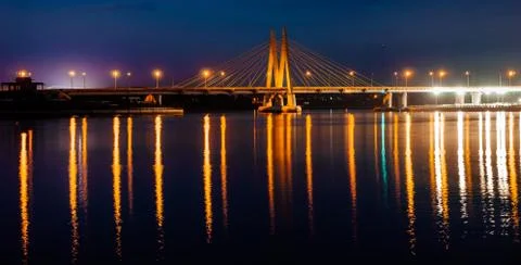 Cable-stayed bridge across the river. The bridge with night lighting in Kazan Stock Photos