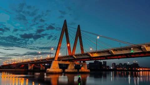 Cable-stayed bridge across the river. The bridge with night lighting in Kazan Stock Photos