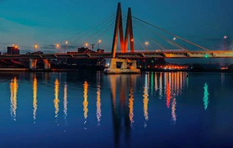 Cable-stayed bridge across the river. The bridge with night lighting in Kazan Stock Photos