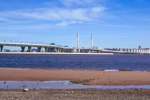 Cable-stayed bridge and expressway across the river Stock Photos