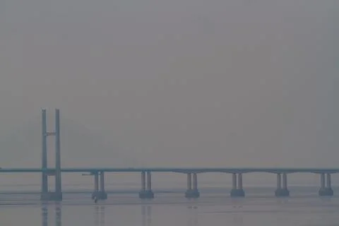 Cable stayed bridge in haze background. Stock Photos