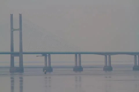 Cable stayed bridge in haze background, landscape. Stock Photos