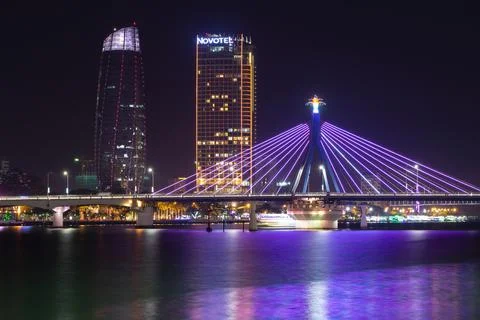 Cable-stayed bridge in the night urban landscape. Da Nang, Vietnam Stock Photos