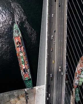 Cable-stayed bridge over the Sea of Japan on the background of the city seap,foo Stock Photos