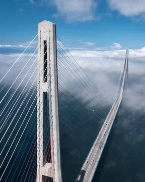 Cable-stayed bridge over the Sea of Japan on the background of the city seap,foo Stock Photos