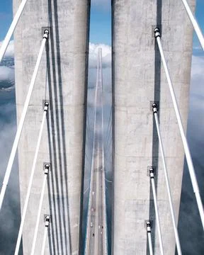 Cable-stayed bridge over the Sea of Japan on the background of the city seap,foo Stock Photos