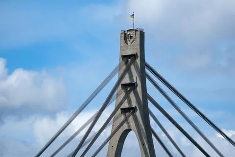 Cable-stayed bridge pylon with suspension cables and blue sky Stock Photos