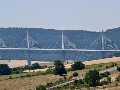 Cable stayed bridge with three tall pylons and radiating cables stretching .. Stock Photos
