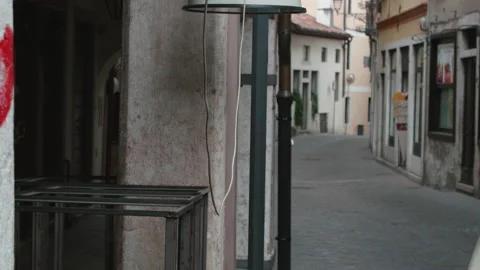 Cable swaying in the wind with a silence of the empty town Stock Footage 130388857