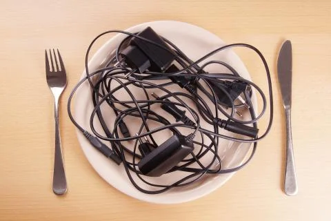 Cable tangle on a plate Stock Photos