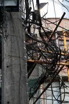 Cable tangles in asian city Stock Photos