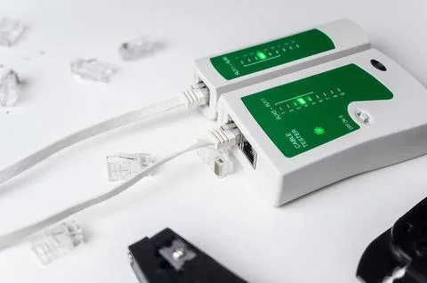 Cable test tool. Ethernet UTP Cat 5 twisted pair test procedure UTP cable Fotos de archivo