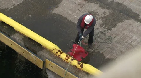 Cable is tied to the bollard Video stock 63119650