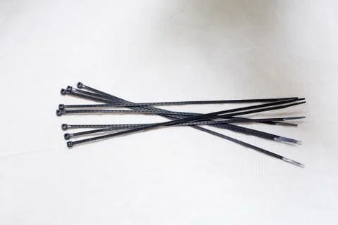 Cable ties with a black color in a white background Stock Photos