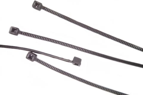 Cable ties on a white background viewed closely Stock Photos