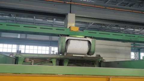 Cable transporter opens and pours grey concrete mixture Stock Footage 124299231