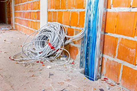 Cable tray with installation cables between floors in building Stock Photos