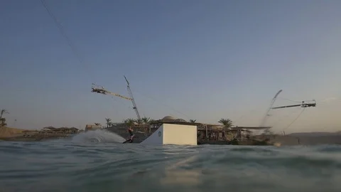 Cable wakeboarder big air Stock Footage 70823356