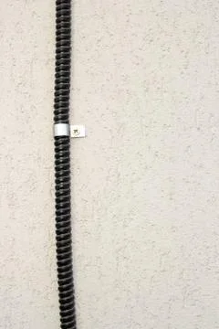 Cable on wall Stock Photos