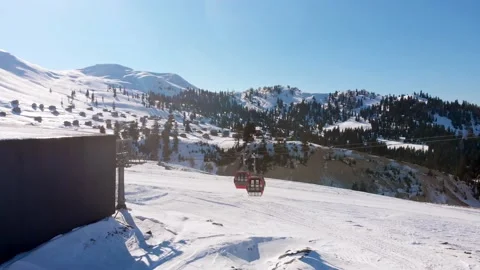 Cable way car in Goderdzi ski resort with old wooden houses in Adjara mount.. Stock Footage 232178600