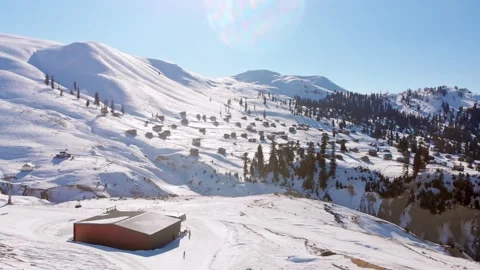 Cable way car in Goderdzi ski resort with old wooden houses in Adjara mount.. Stock Footage 232389235