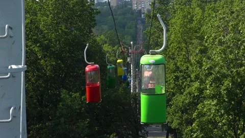 The cable way with different colored cabins at the public park. Stock Footage 169364522