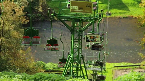 Cable way river, empty cabins across high mountain, no tourists, click for HD Stock Footage 43861587