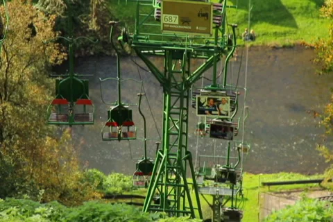 Cable way river, empty cabins across high mountain, no tourists, click for HD Stock Footage 43917566