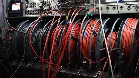 Cables and control panel detail from a television broadcasting truck Stock Footage 98863937