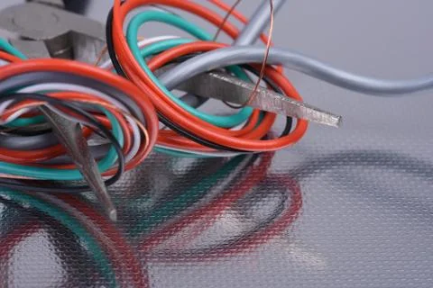 Cables and tools used in electrical installation Stock Photos