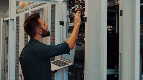 Cables in Big Data Center.Connecting Lan Cable To Mainframe.IT Patching Network Video stock 152990977