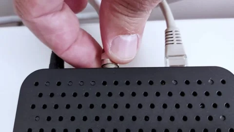 Cables Click Into Place: Quick Setup Guide for Your Router Stock Footage 312377557