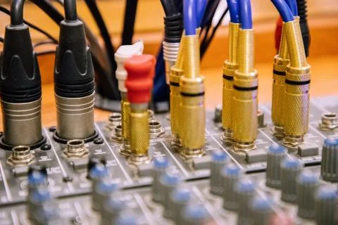 Cables entering mixer table perspective view blurred Stock Photos