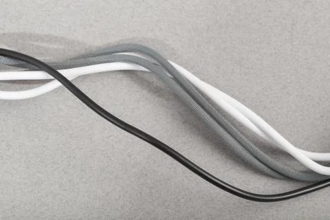 Cables  on grey background Stock Photos