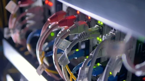 Cables plug to supercomputer for cryptocurrency mining. 4K. Stock Footage 80143203
