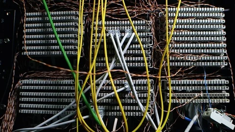 Cables plugged into a network connector 스톡 동영상 94378947