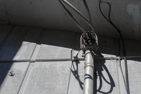 Cables on the Side of a House Stockfoto's