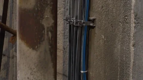 Cables on the wall of an old factory, Germany Stock Footage 305550787