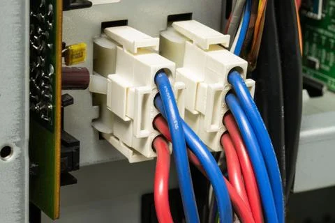 A cables Wire-to-Wire Connector System, featuring various colors like red Photos