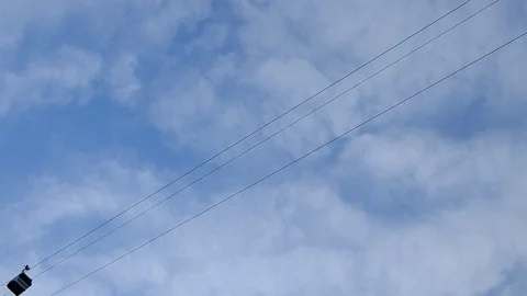 Cableway against the blue sky. Video stock 128793373