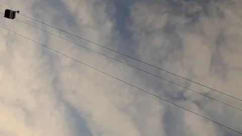 Cableway against the blue sky. Video stock 128793660