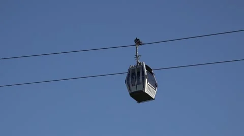 A cableway on a background of blue sky Stock Footage 52543155