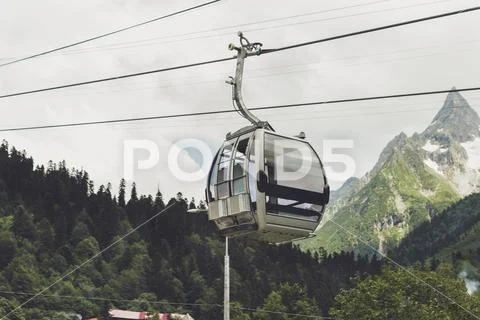 Cableway cabin in the mountains Stock Photos