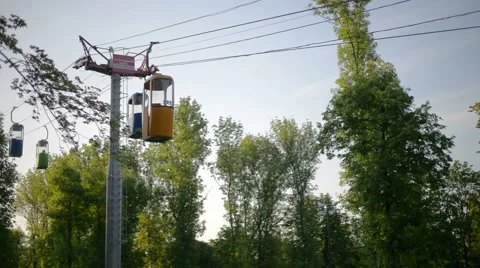 Cableway with cabins on blue sky background, Vinpearl Amusement Park Stock Footage 63434596