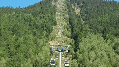 Cableway cabins ride up to the le Brevent peak, Mont-Blanc Chamonix, France Stock Footage 73102297