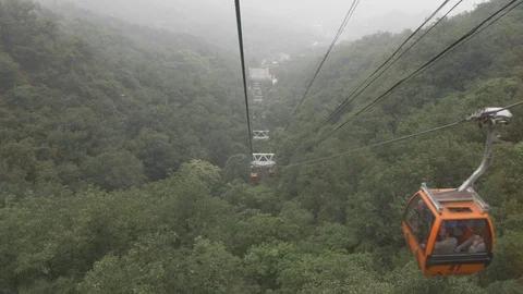 Cableway to Great Wall of China transporting people in beautiful nature Stock Footage 118915950