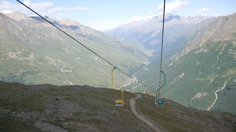 Cableway in the mountains. Gorge view Stock Footage
