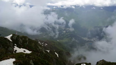 Cableway with open seats in mountains Stock Footage 98494855