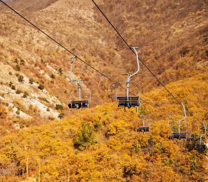 Cableway over the mountains Stock Photos