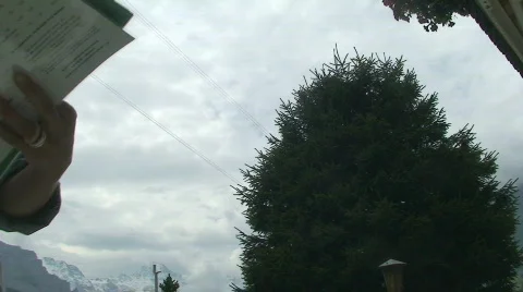 Cableway passing behind waitress Stock Footage 809065